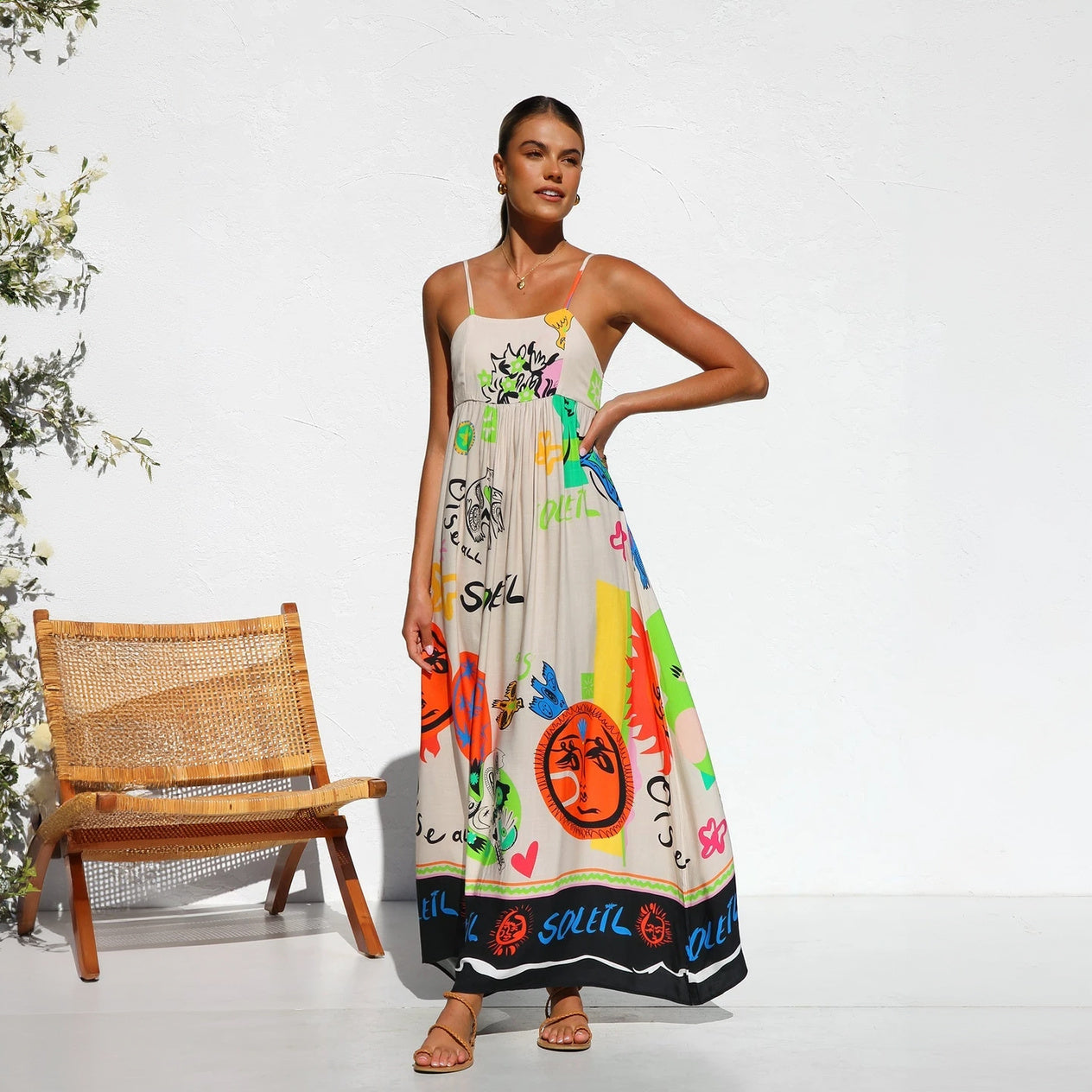 Women's Beige Maxi Dress – Bohemian Artistic Print, Spaghetti Straps, Gathered Bust, Black Hemline-76780-a128ad2c-cf94-460c-94c0-517219acb7d4
