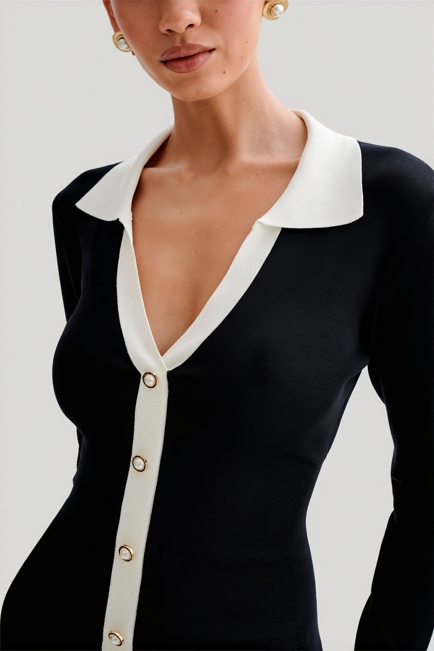 Women's Black Knit Dress – Contrast Collar, Gold Buttons, Ruffled Hem, Ribbed Fit-81069-8f9f733e-173b-4d8e-abe9-a08764051a18